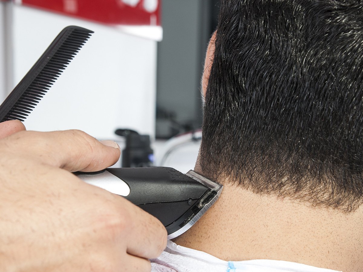A man getting his hair cut